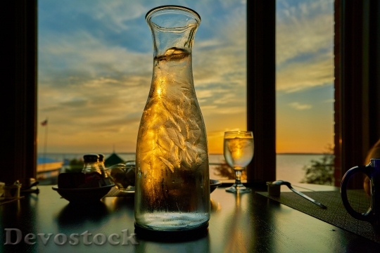 Devostock Lights Water Bottle Sunset 4K.jpeg