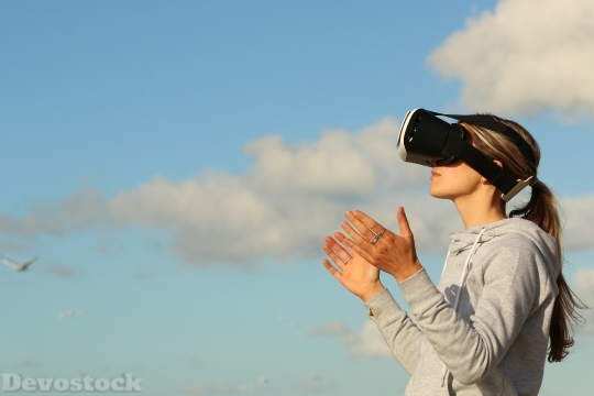 Devostock Girl Sky Virtual Reality 4k