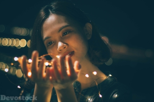 Devostock Lights Face Girl Hands 4K.jpeg