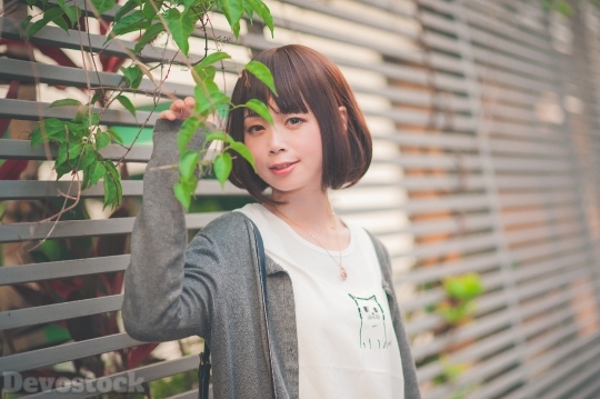 Devostock Taiwanese Lady Standing Tree Girl 4k