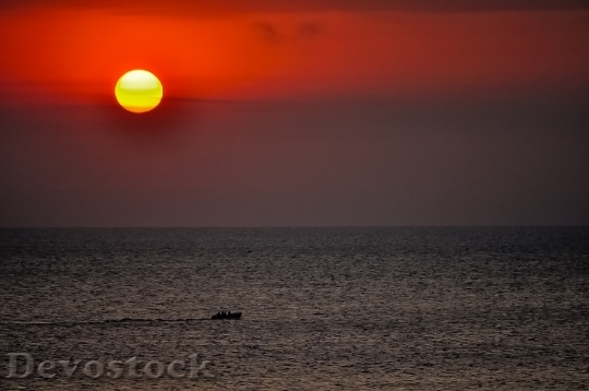 Devostock Ocean Sun Cloudscape Sunset