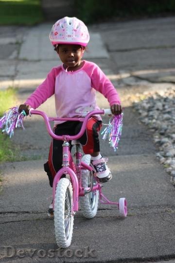 Devostock Child Biking African American