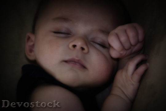 Devostock Peace Sleeping Baby Hands