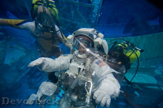 Devostock Astronaut Spacesuit Under Water HD