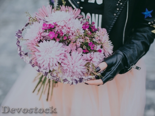 Devostock Woman Hand Flowers 103586 4K