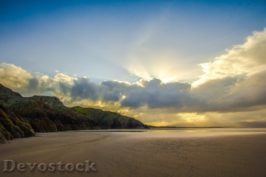 Devostock Beach Sun Rays Ocean Rocks 163869 4K.jpeg
