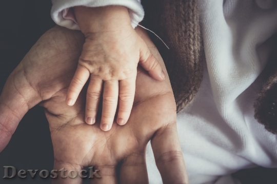 Devostock Father Son Hand Love