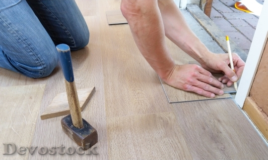 Devostock Floor Flooring Hand Man 13944 4K.jpeg