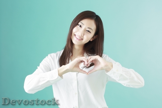 Devostock Japanese Girl Heart Symbol 4K