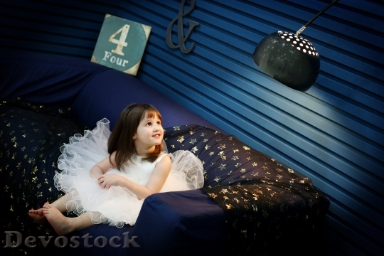 Devostock Little Girl Angel Indoor Room 4K.jpeg