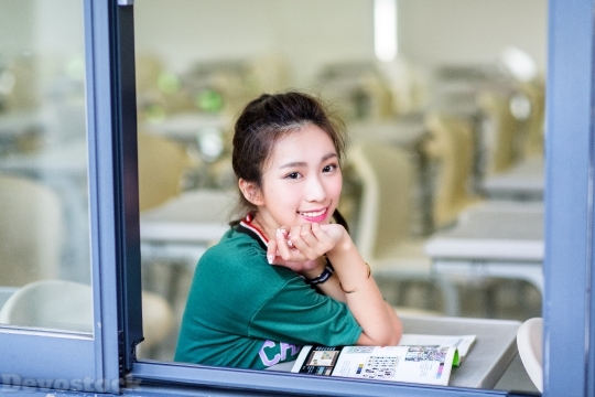 Devostock Asian Cute Teen Girl Reading 4k