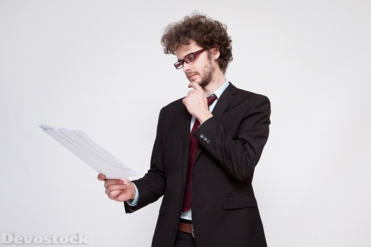 Devostock Businessman Male Glasses Reading 4k
