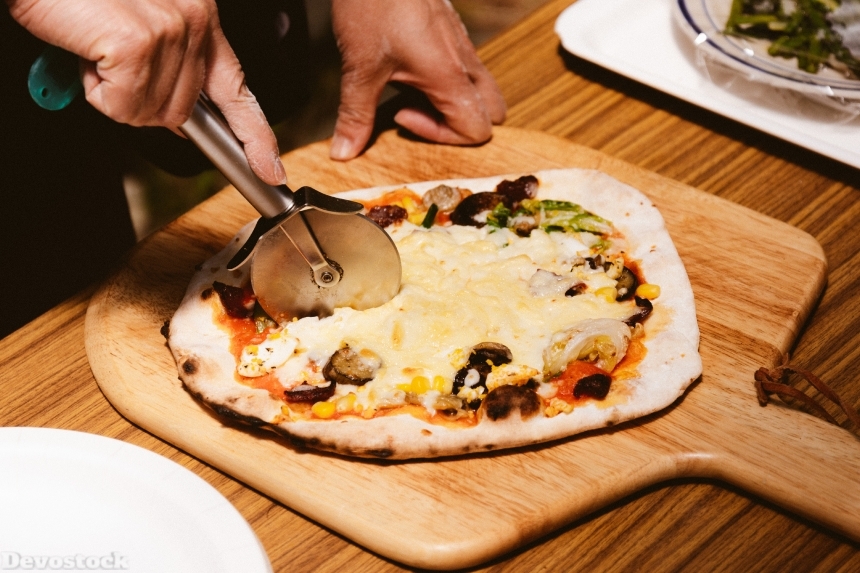 Devostock Food Making Baking Cooking Pizza Cheese Herbs Spliting 4k