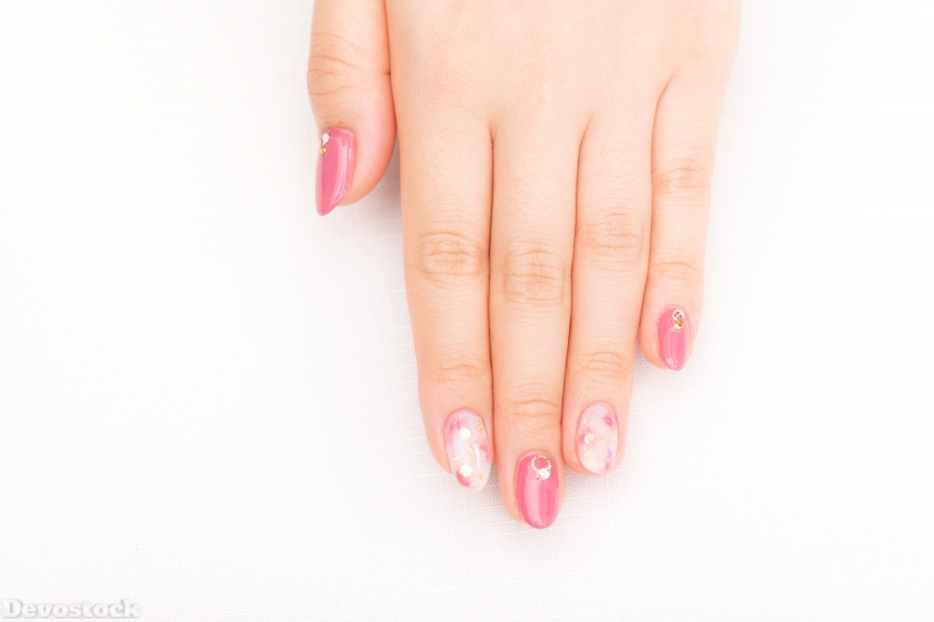 Devostock Girl hand Fingers Nail Arts Pink White Color 4k