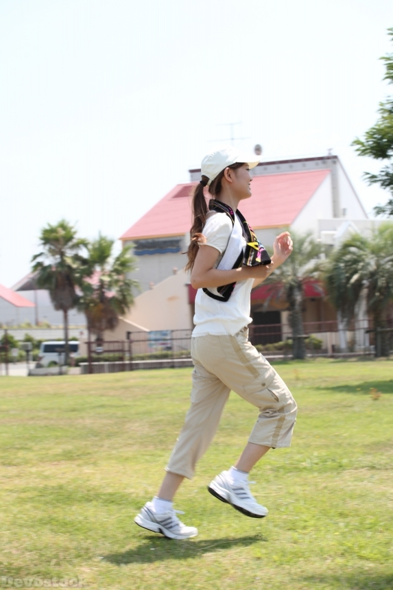 Devostock JAPANESE WOMAN RUNNING LAWN 4k