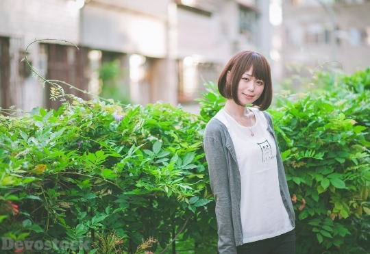 Devostock Taiwanese Lady Standing Outdoor Smiling Girl 4k