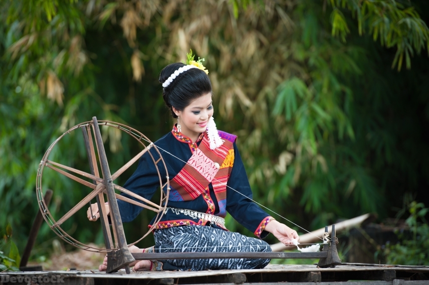 Devostock Thai Woman Spinning Wheel Traditional Dress String 4k