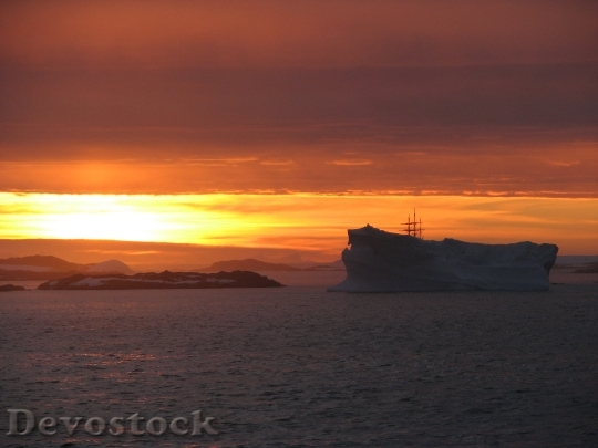 Devostock Antarctica Iceberg Sunset Midnight