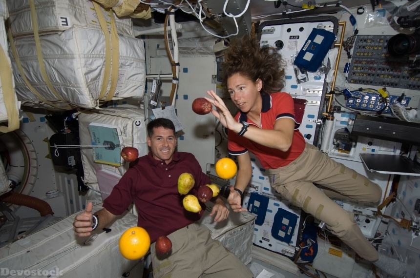 Devostock Astronauts Floating Fruit Space