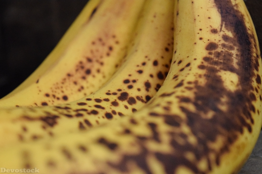 Devostock Bananas Spots Yellow Background