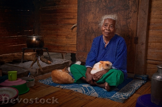 Devostock Old Woman Love Cat Old House 