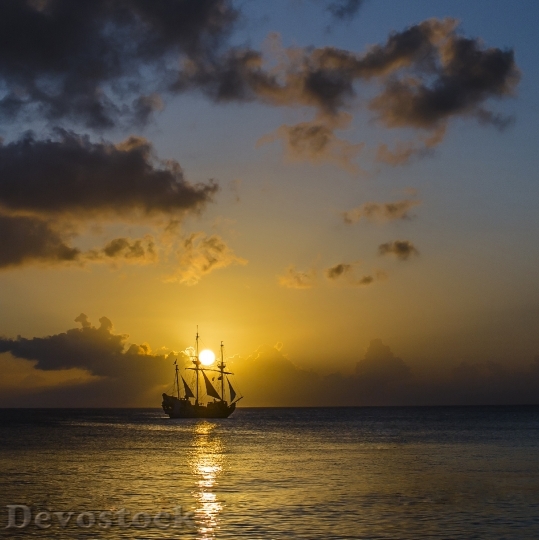 Devostock Sunset Island Ship Sea