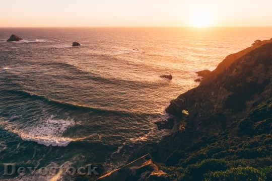 Devostock Sunset Ocean Waves Cliff