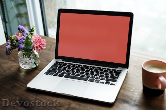 Devostock Laptop on a wooden table