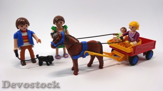 Devostock Lego family and wagon horse riding