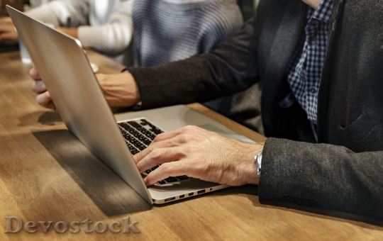 Devostock Man working on a laptop