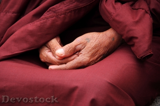 Devostock Monk hands faith person