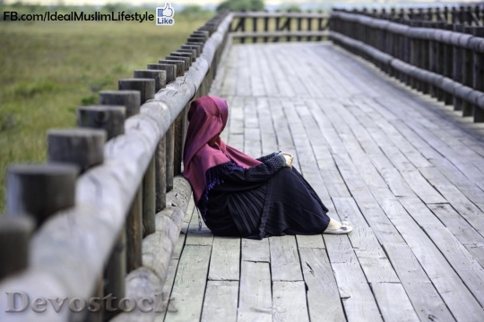 Devostock Muslim woman looking 
