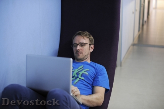 Devostock Startup Business People Working on Laptop