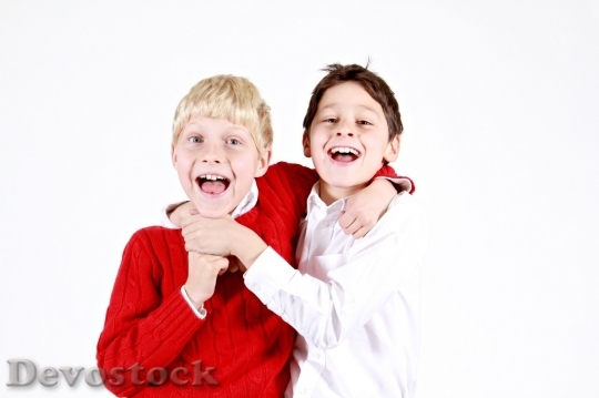 Devostock Two boys laughing