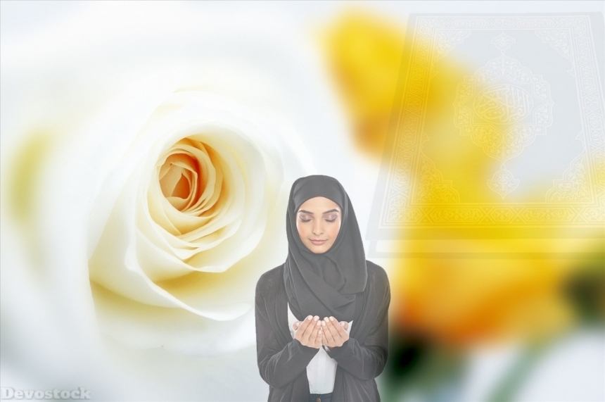 Devostock Woman praying in Hijab