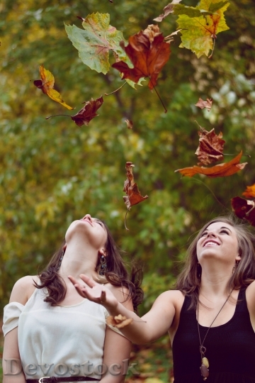 Devostock Autumn Leaves Girls Outdoors