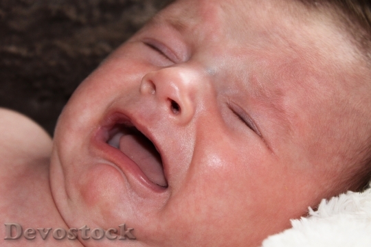 Devostock Baby Newborn Tears Sad
