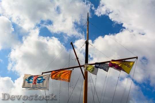 Devostock Clouds Sky Flags Ship
