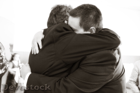 Devostock Hugging Hug Father Son