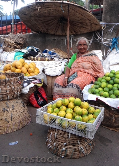 Devostock India Woman Market Vegetables