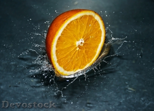 Devostock Orange Falling Water Splash