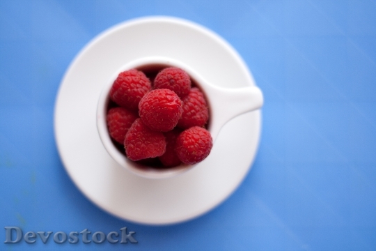 Devostock Raspberries In Cup