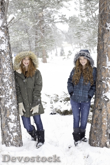 Devostock Sisters Redheads Winter Snowing