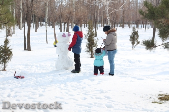 Devostock Snowman Family Winter Snow