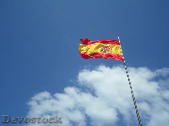 Devostock Spain Flag Flutter Sky
