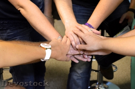 Devostock Team Together Hands Joined