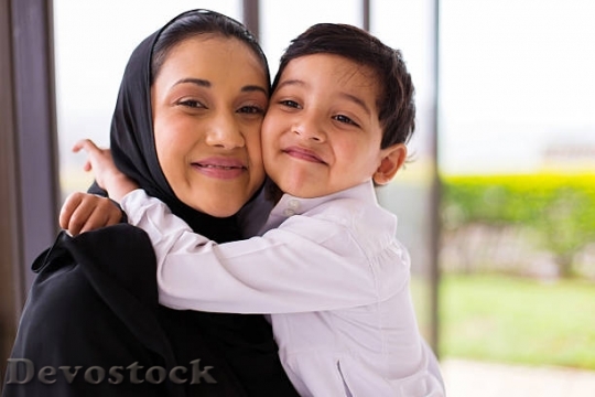 Devostock muslim-boy-hugging-his-mother-picture-id513384360@$1