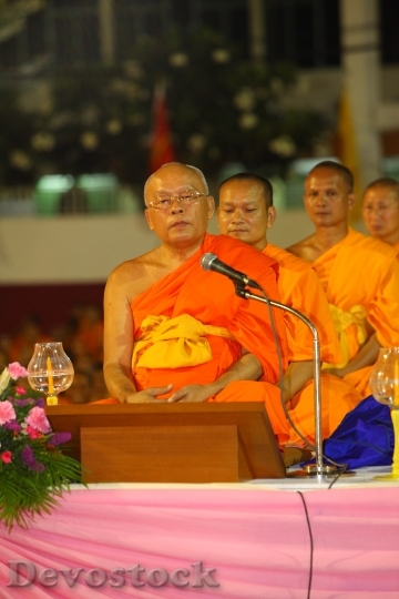Devostock Buddhists Monks Orange Robes 0