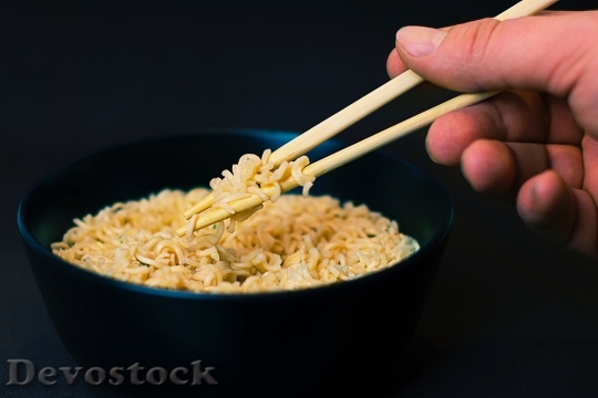 Devostock Hand Eating Chopsticks Food 74153 4K.jpeg